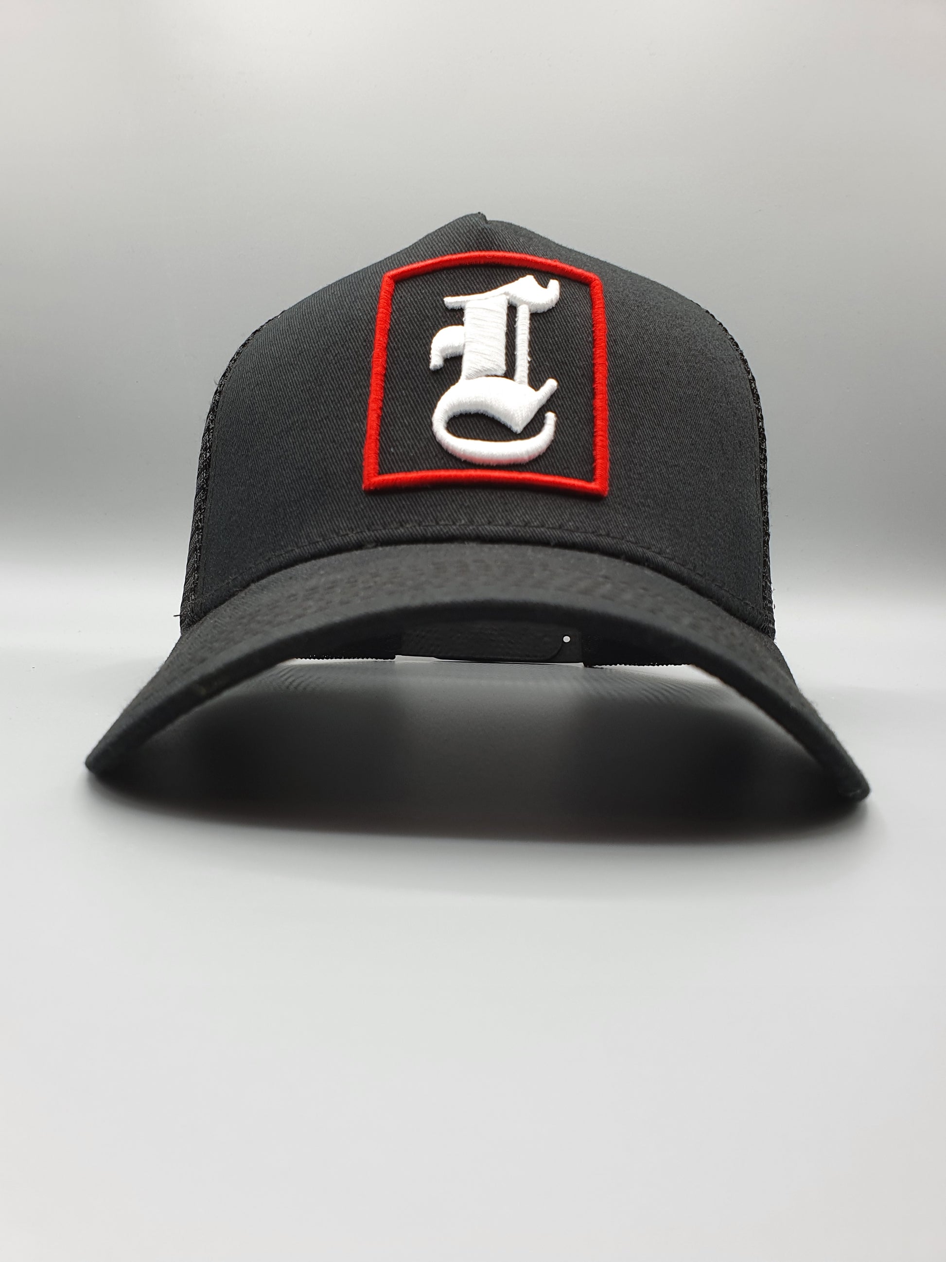 ONYX BLACK AND RED TRUCKER CAP - Lucido Clothing